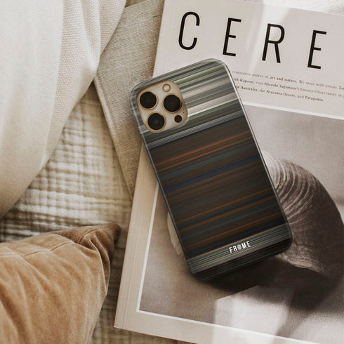 sinners Frome phone case next to interior items