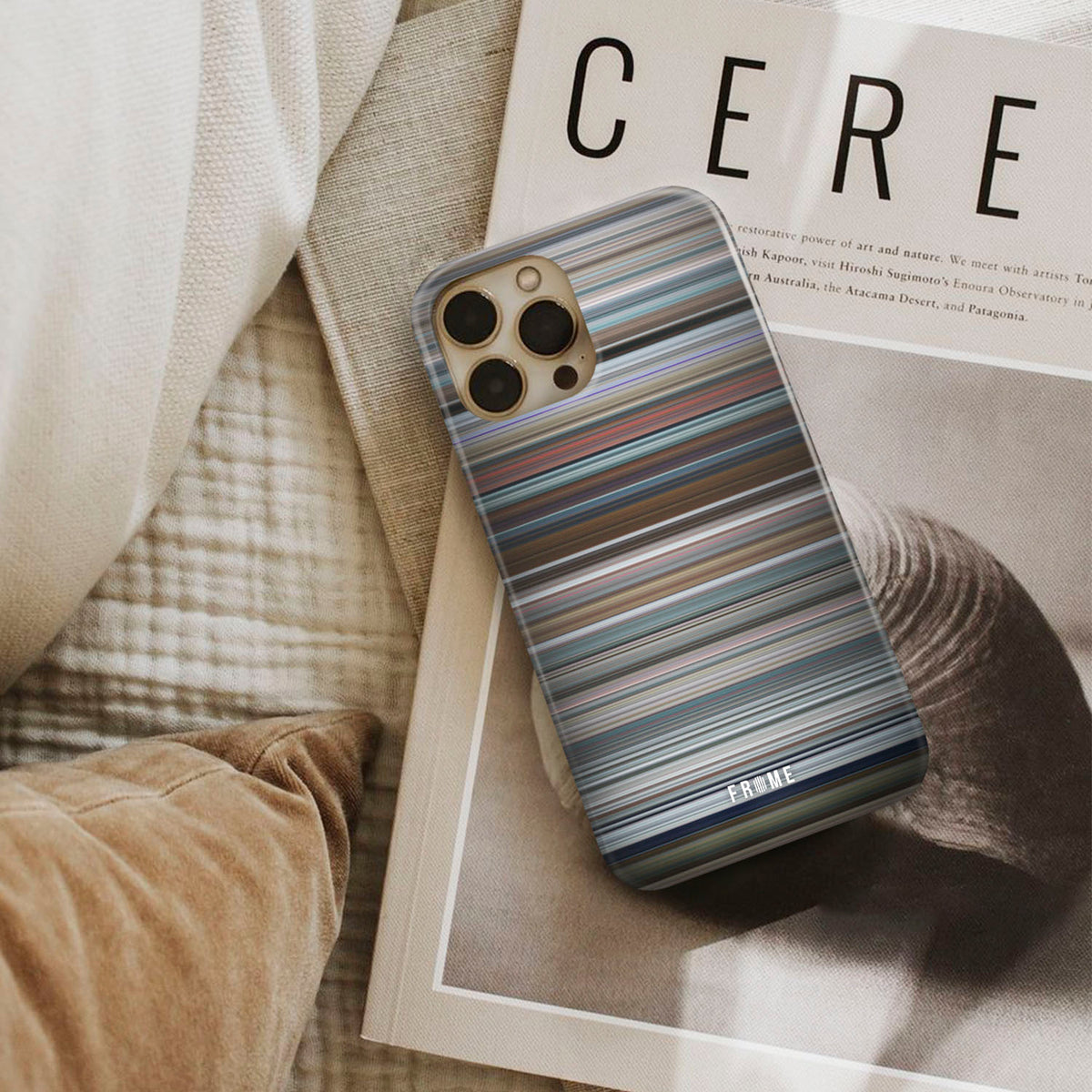 free_guy Frome phone case next to interior items