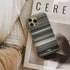 interstellar Frome phone case next to interior items