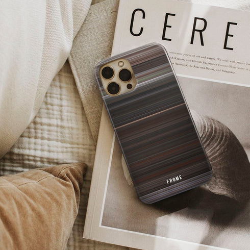 goonies Frome phone case next to interior items