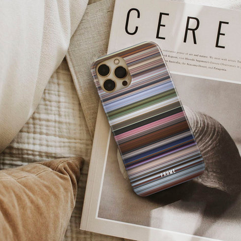 up Frome phone case next to interior items