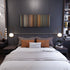 Bedroom interior with Ocean's Eleven Frome on the wall