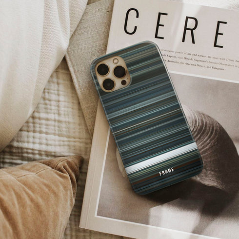 arrival Frome phone case next to interior items