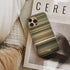 the fall (2006) Frome phone case next to interior items