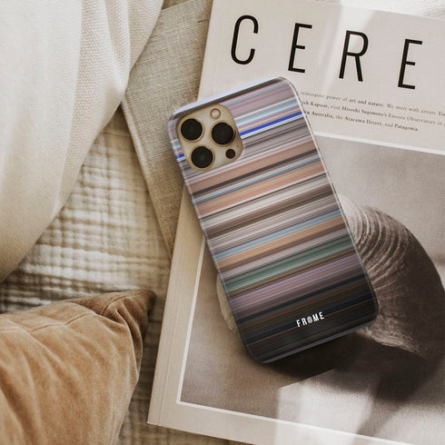 elf Frome phone case next to interior items