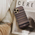 high fidelity Frome phone case next to interior items