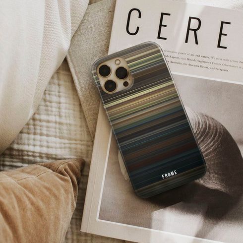 a quiet place Frome phone case next to interior items