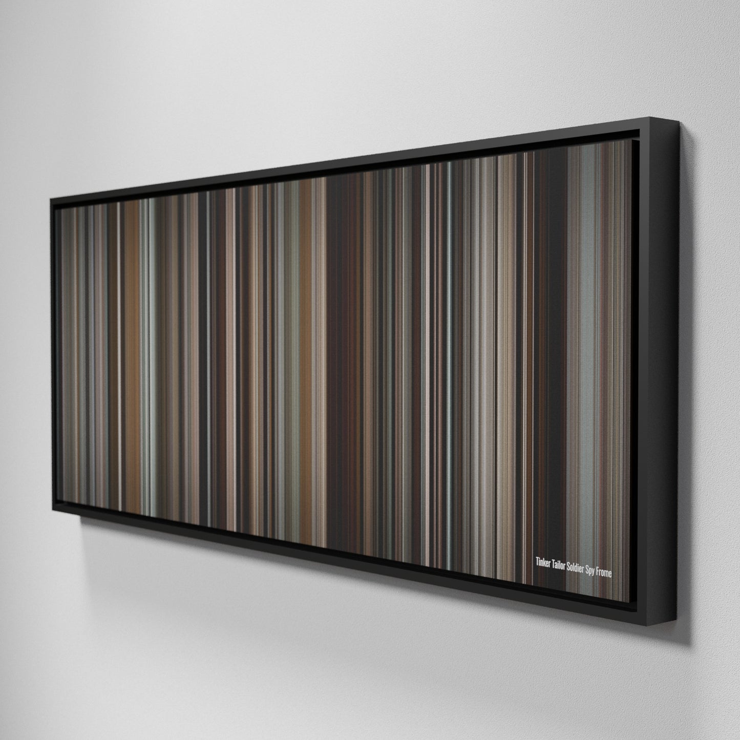 Side view of Framed Buff's of Tinker Tailor Soldier Spy Frome on the wall