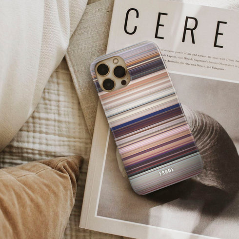 cars Frome phone case next to interior items