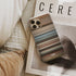 juno Frome phone case next to interior items