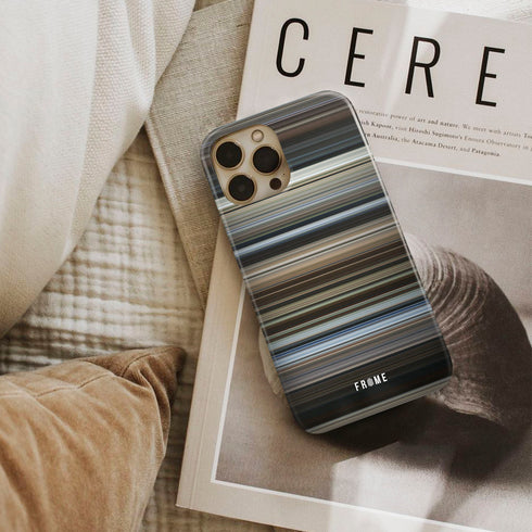 cast away Frome phone case next to interior items