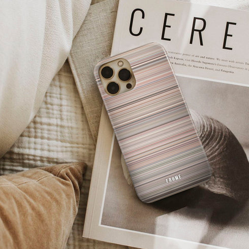 senna Frome phone case next to interior items