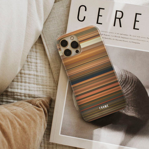 curse of the golden flower Frome phone case next to interior items