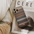 mr. deeds Frome phone case next to interior items