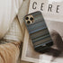 the bourne identity Frome phone case next to interior items