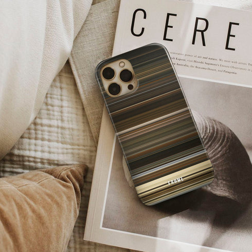 the fountain Frome phone case next to interior items