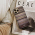 scent of a woman Frome phone case next to interior items