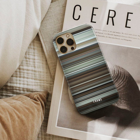 manchester by the sea Frome phone case next to interior items