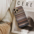 serendipity Frome phone case next to interior items