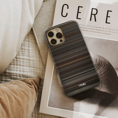 the road Frome phone case next to interior items