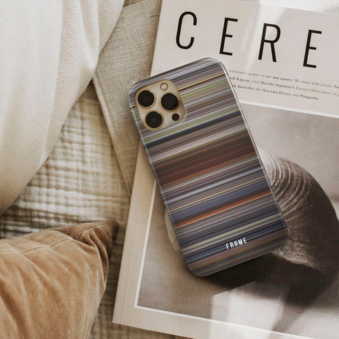 the color purple Frome phone case next to interior items