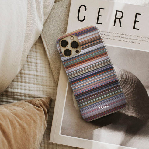 the incredibles Frome phone case next to interior items