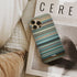 layer cake Frome phone case next to interior items