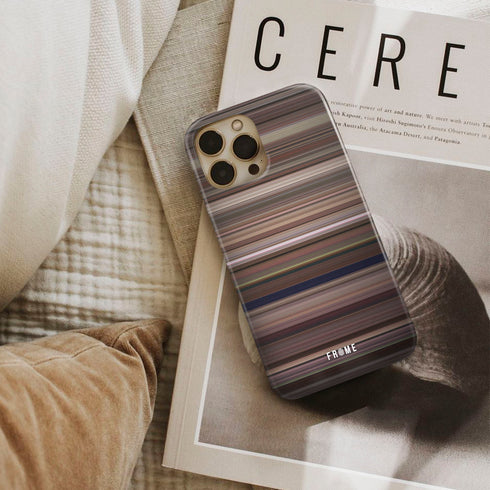 tootsie Frome phone case next to interior items