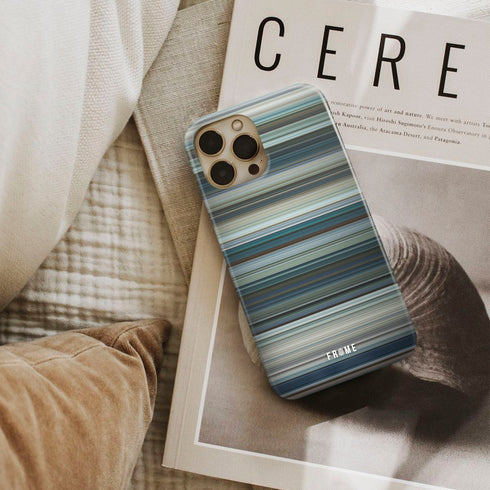 chappie Frome phone case next to interior items