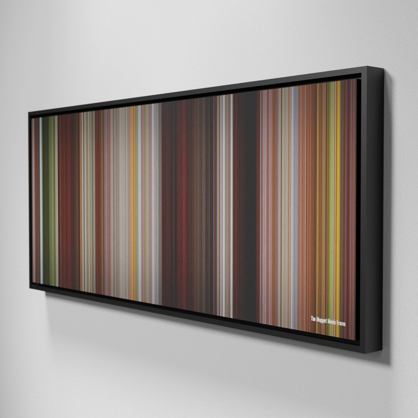 Side view of Framed Buff's of The Muppet Movie Frome on the wall