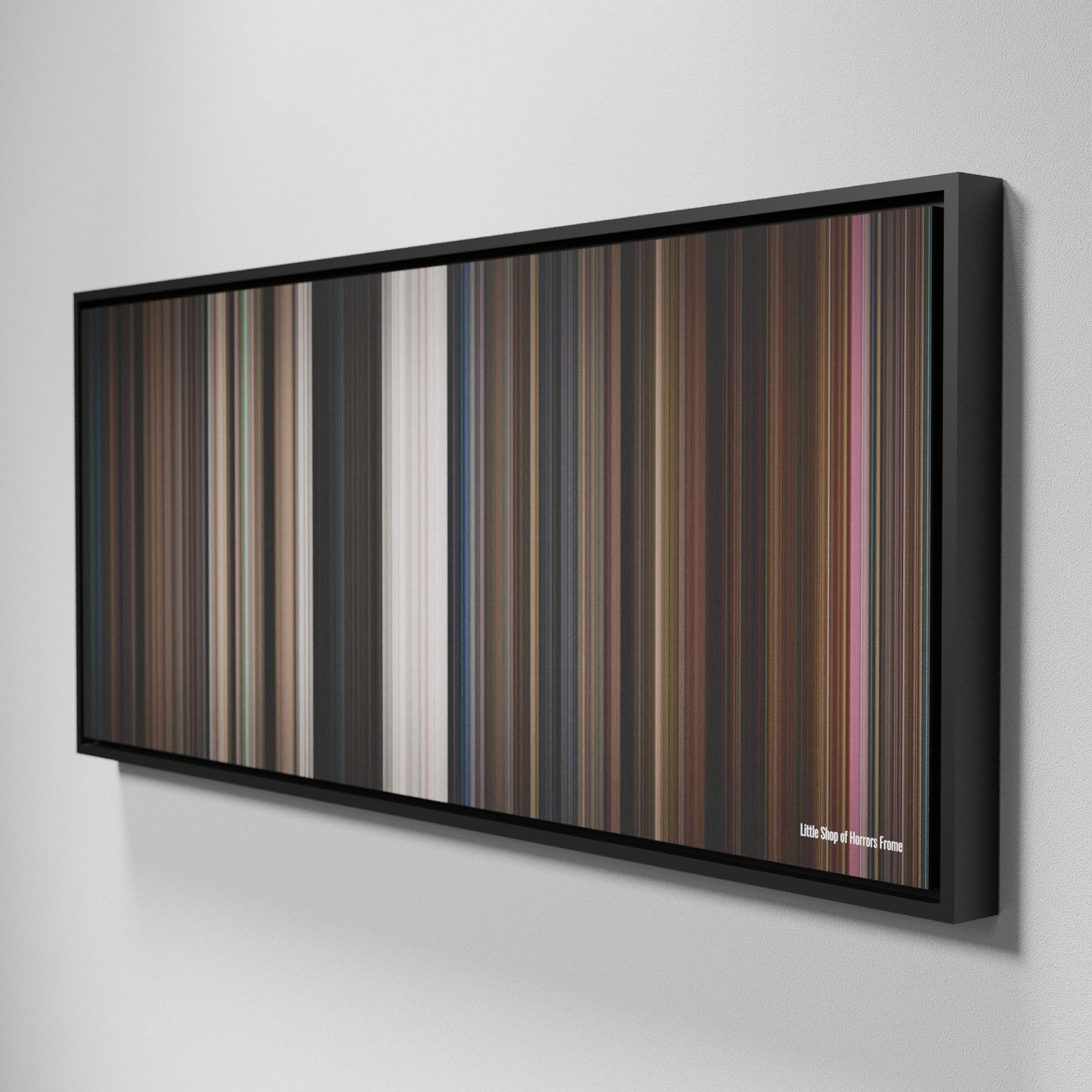 Side view of Framed Buff's of Little Shop of Horrors Frome on the wall