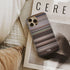 kate & leopold Frome phone case next to interior items