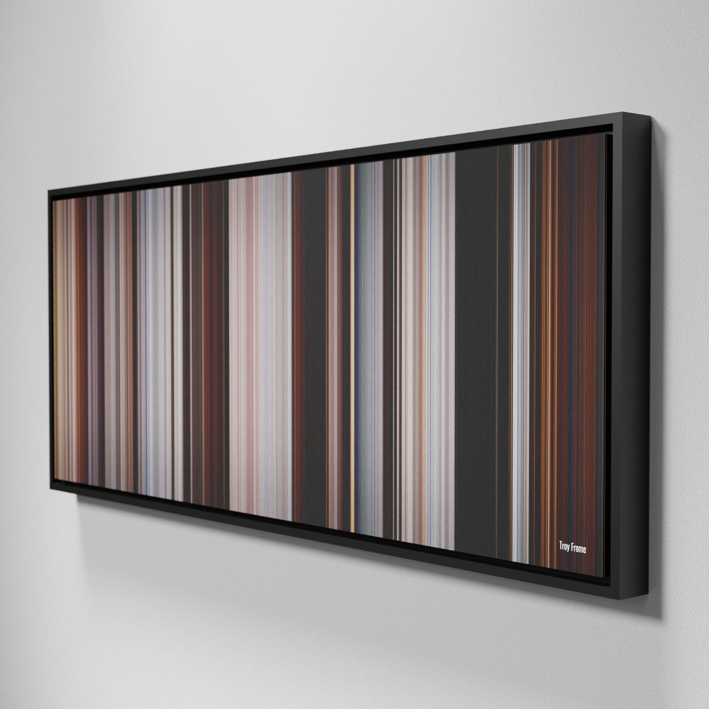 Side view of Framed Buff's of Troy Frome on the wall