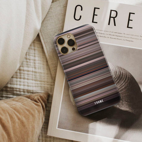 spartacus Frome phone case next to interior items