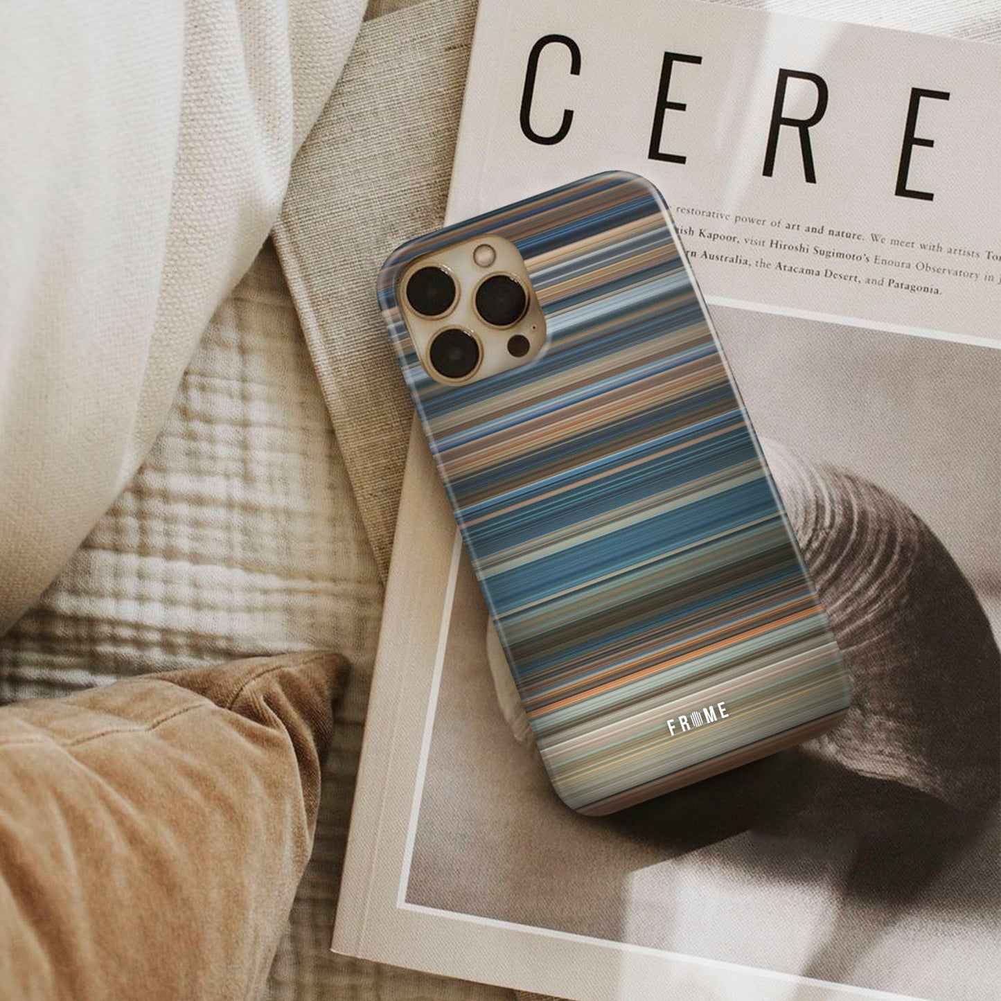 true lies Frome phone case next to interior items