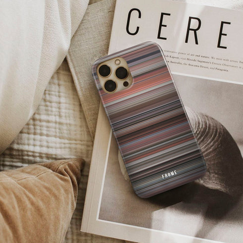 beat street Frome phone case next to interior items