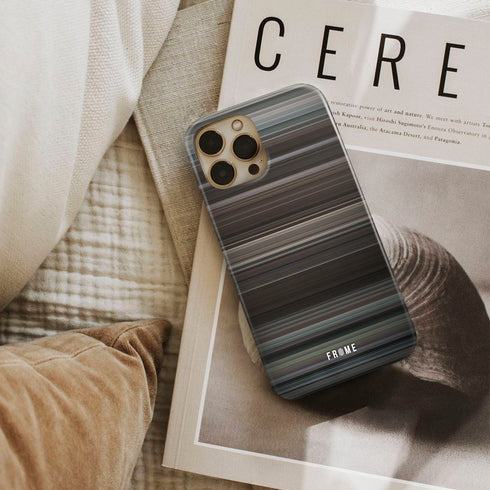 the great escape Frome phone case next to interior items