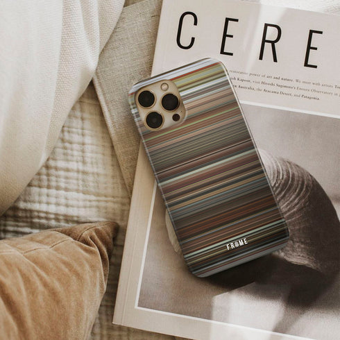 lucky number slevin Frome phone case next to interior items