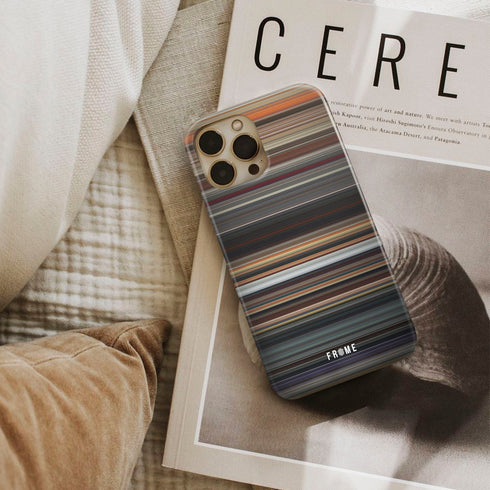 divergent Frome phone case next to interior items