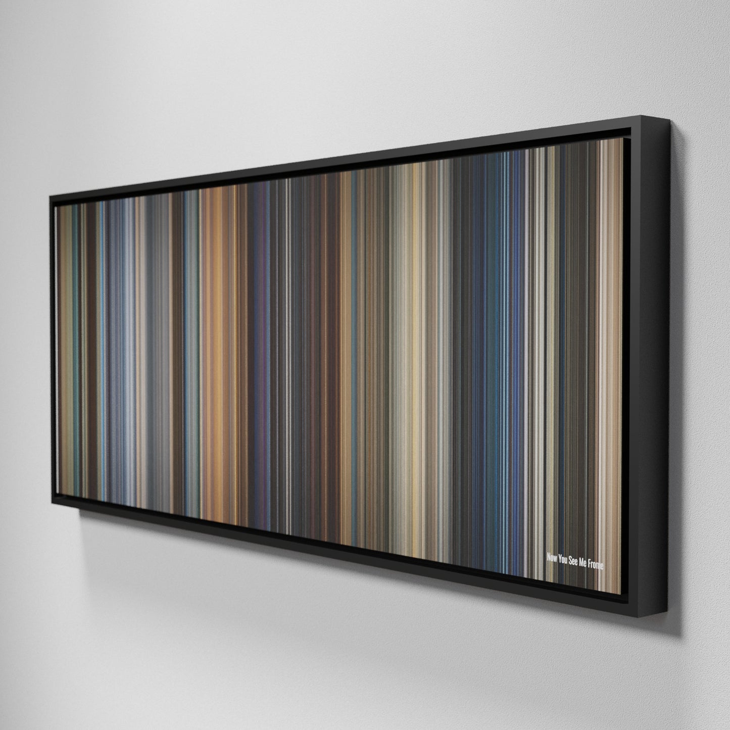 Side view of Framed Buff's of Now You See Me Frome on the wall