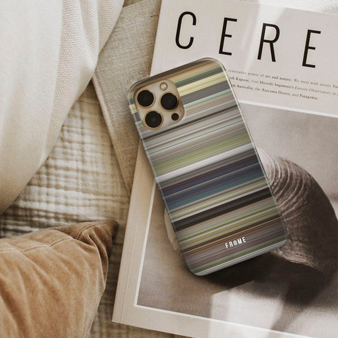 the internship Frome phone case next to interior items