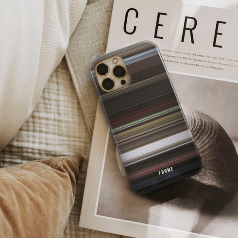 good omens - hard times Frome phone case next to interior items