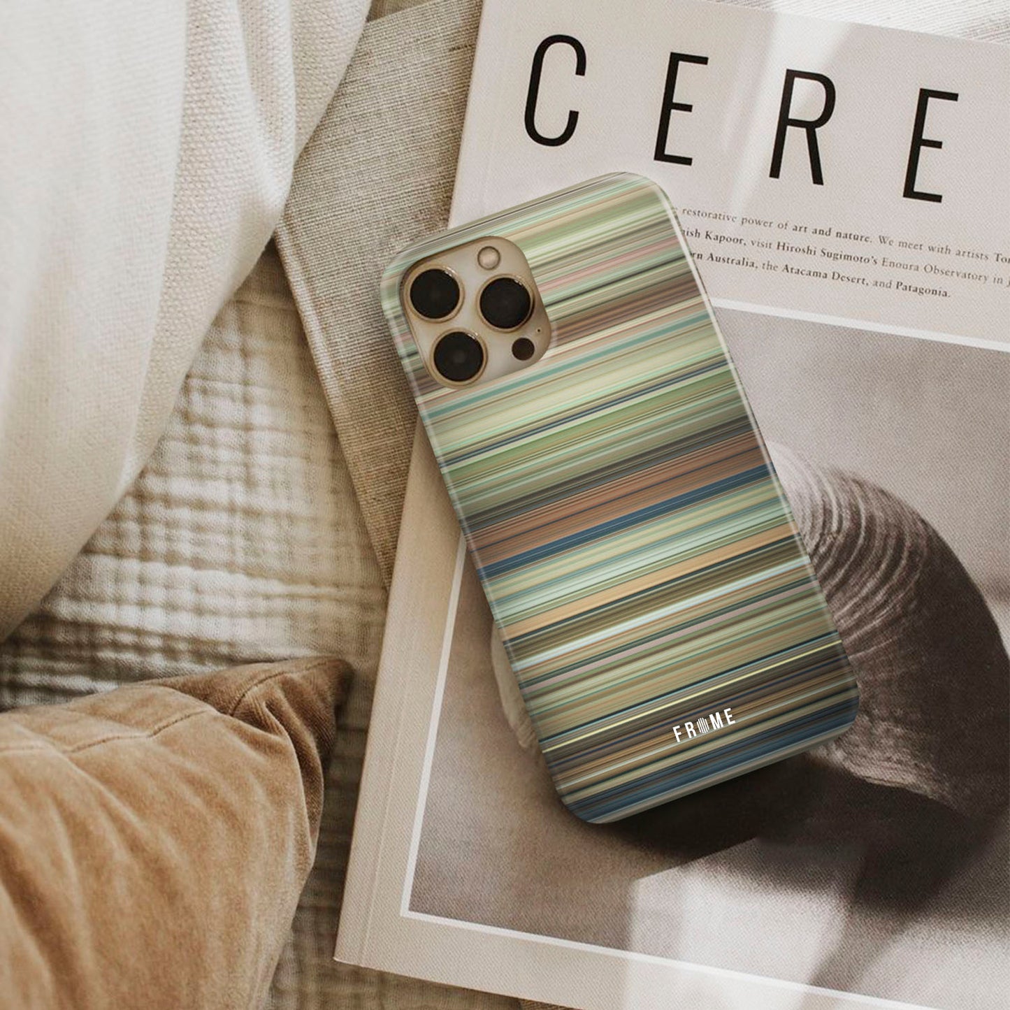 whisper of the heart Frome phone case next to interior items