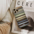 cold mountain Frome phone case next to interior items