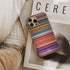 brother bear Frome phone case next to interior items