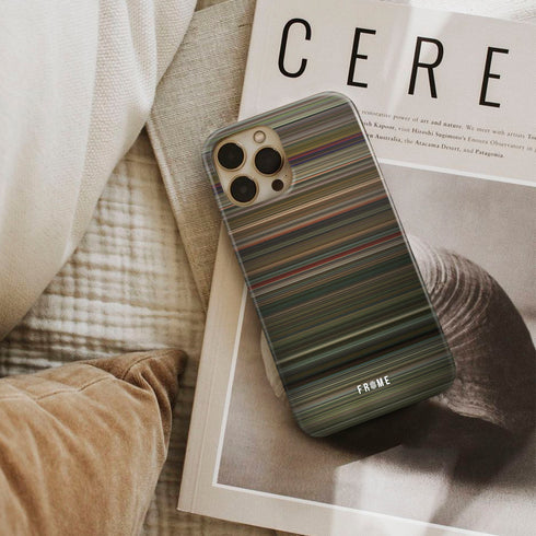 time lapse Frome phone case next to interior items