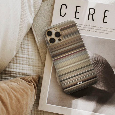 chef Frome phone case next to interior items