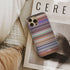 cars 2 Frome phone case next to interior items