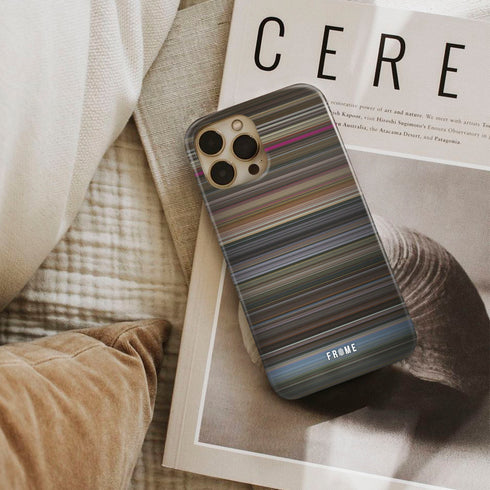 the gentlemen Frome phone case next to interior items