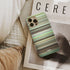the wind rises Frome phone case next to interior items